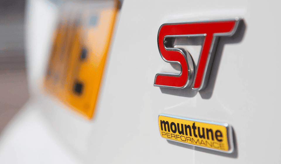 Close shot of ST and Mountune badges