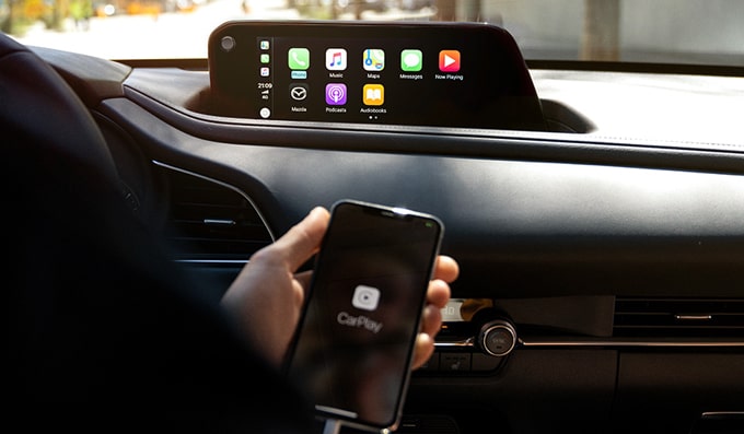 Touch and voice activated Mazda CX-30 infotainment system with Apple CarPlay and Android Auto connectivity.